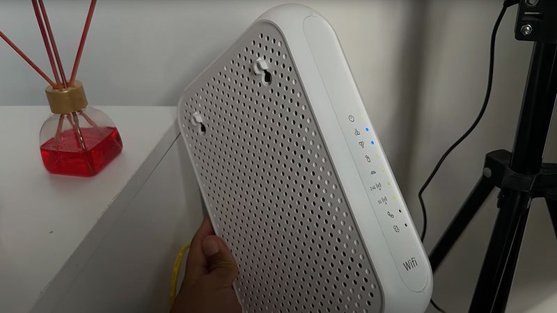 Router de internet configurado para abrir puertos y optimizar NAT en PS5.